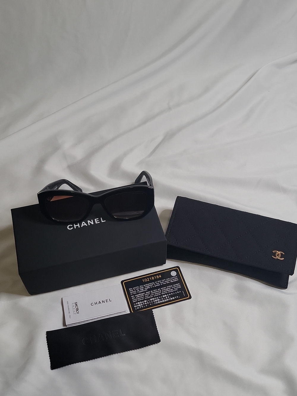 CHANEL Black Cat-Eye Sunglasses with Quilted Black Case